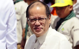 Philippine President Benigno Aquino arrives during the 29th anniversary celebration of the revolt known as People Power revolution at the People's Power Monument in suburban Quezon city, north of Manila, Philippines. Photo: AP