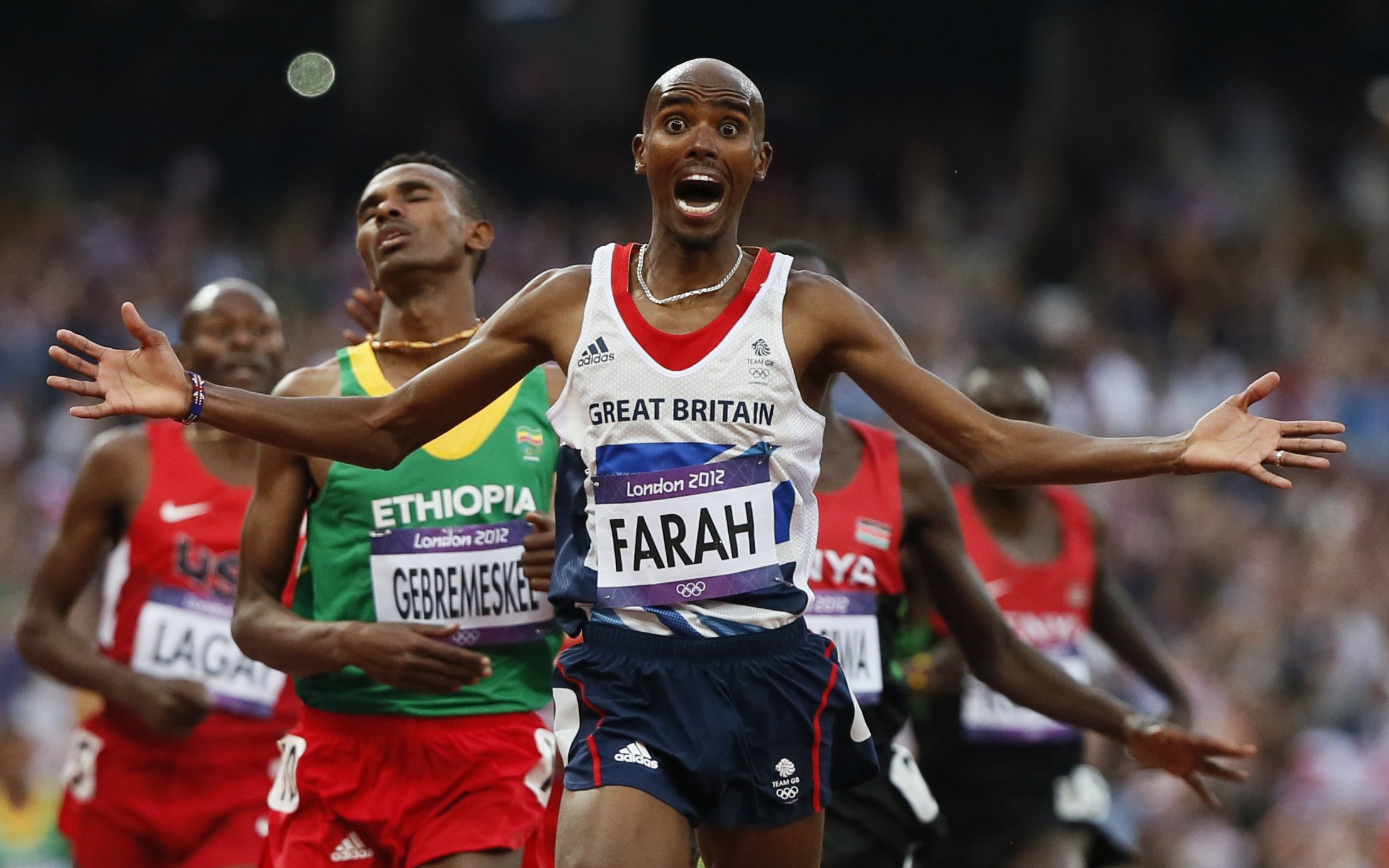 Britain's Mo Farah makes history by defending 10,000m title at
