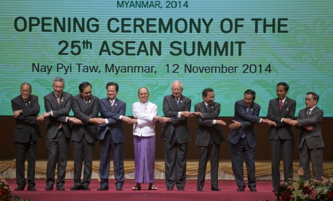 Host Thein Sein of Myanmar is flanked by the prime ministers of Vietnam and Malaysia at the Asean meeting. Photo: AP