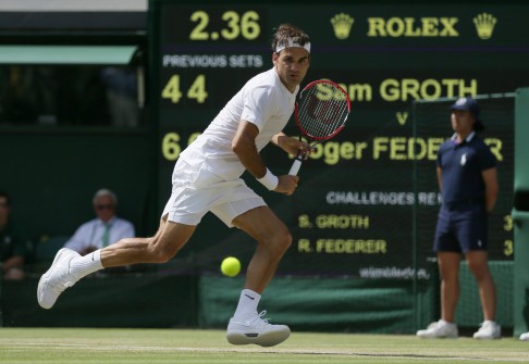 Roger Federer marches on at Wimbledon but reality bites for Dustin Brown |  South China Morning Post